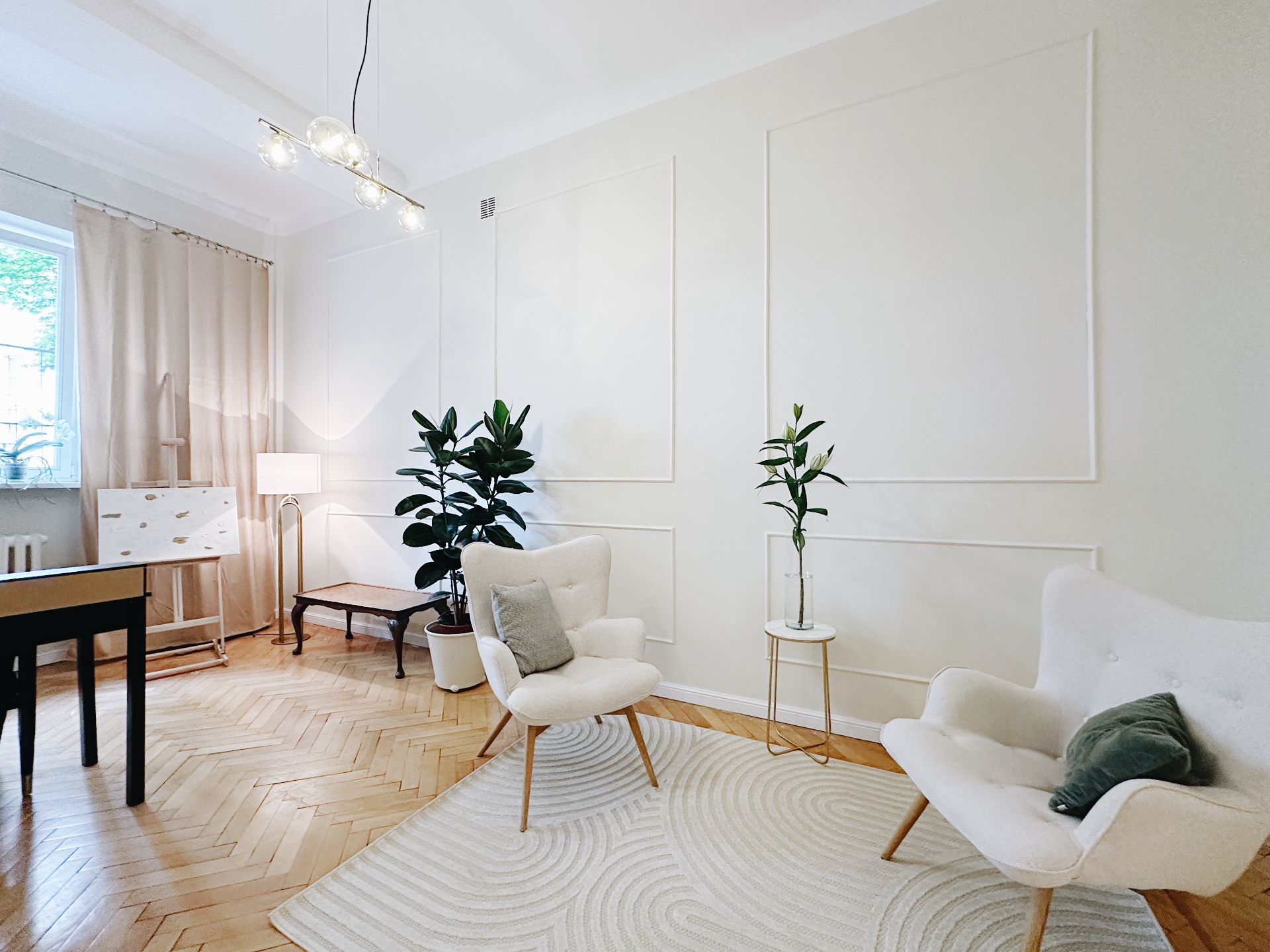Liberté office - wall panels, armchairs and herringbone parquet flooring